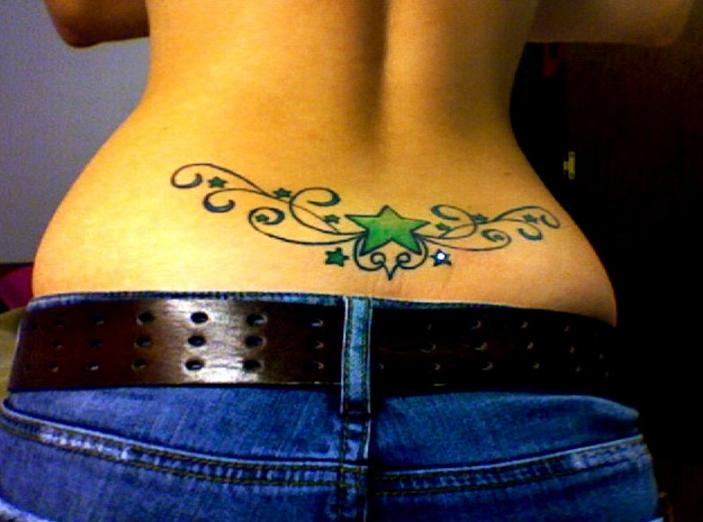 lower back tattoo designs,girls lower back tattoos,feminine lower back tattoo,tattoo of lower back,flower lower back tattoo designs