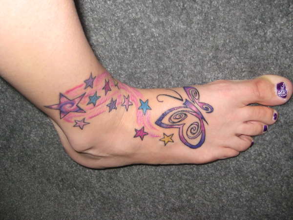 cute foot tattoos for girls,butterfly foot tattoo design,feminine butterfly tattoo of foot,butterfly tattoo designs for foot