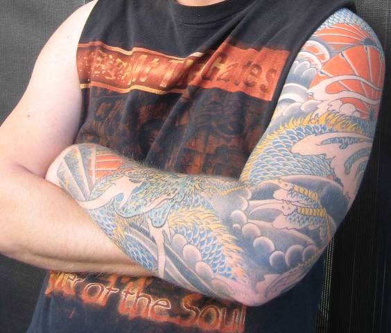 sleeve tattoo designs for men,cool sleeve tattoos for men,men tattoo of sleeves,popular sleeve tattoo designs for men,men sleeve tattoo ideas