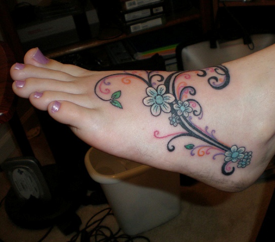 flower tattoo designs for foot,women flower foot tattoos,vine tattoos for feet,Women flower foot tattoo designs