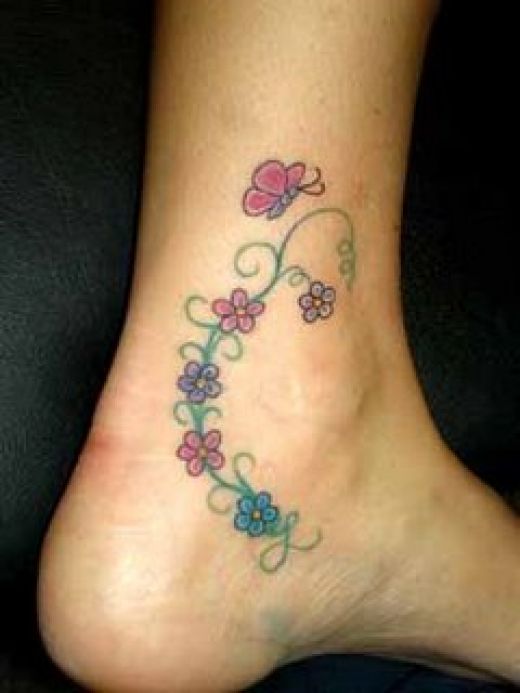 flower vine tattoo designs,vine flower tattoos for women,women flower vine tattoo designs,women vine tattoos of flower,flower vine tattoo designs images