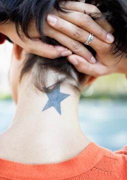 Neck tattoos for women,neck tattoo designs for girls,cute neck tattoos,neck tattoo pain