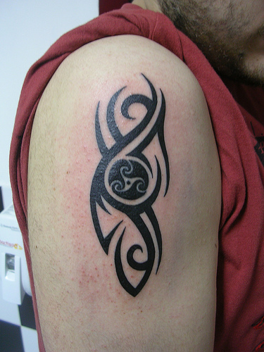 tribal tattoo designs for arm,arm tribal tattoos,arm tribal tattoos meanings,tribal arm tattoos for men,tribal arm tattoo designs pictures