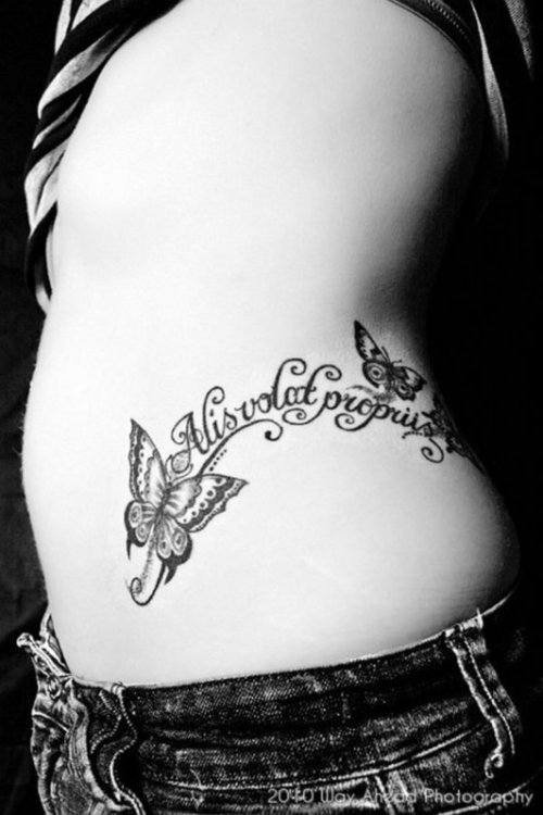 awesome rib tattoos for girls,rib cage tattoo designs for girls,butterfly rib cage tattoos,beautiful rib cage tattoo designs for girls