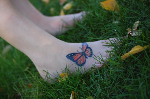 butterfly tattoos on foot,butterfly tattoos on girls feet,girls foot tattoo designs,butterfly foot tattoos images