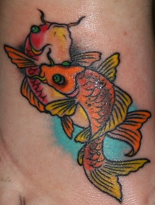 koi fish tattoo designs,japanese koi fish tattoos,japanese fish tattoos,koi fish tattoo ideas,colorful koi fish tattoo designs images