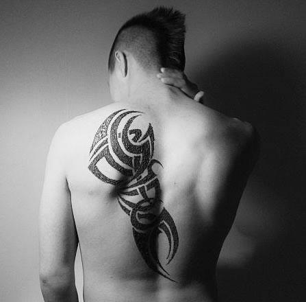 back tribal tattoo designs,tribal tattoos on back,tribal tattoo designs for men back,back tribal tattoos ideas