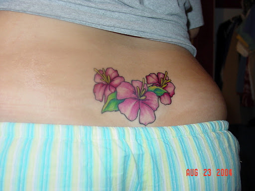 female flower tattoo designs,top flower tattoos,popular flower tattoos for girls,girls flower tattoos ideas
