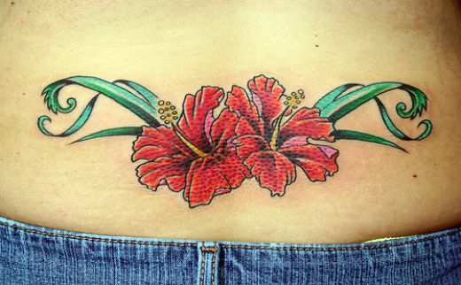 lower back tattoo designs,lower back tattoos for women,lower back flower tattoos,flower tattoo designs for lower back,lower back flower tattoos ideas