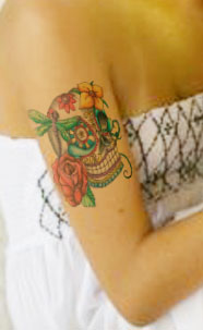 skull tattoo designs,skull tattoos for girls,girls skull tattoo designs,girls skull tattoos cute
