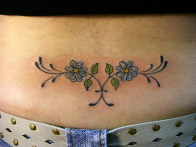 beautiful lower back tattoos,women with lower back tattoo,lower back tattoo designs for girls,lower back tattoos images,latest lower back tattoo designs 2012-2013