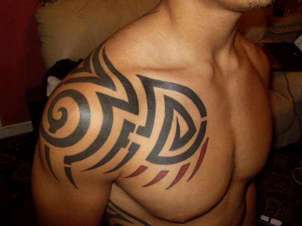 tribal chest tattoo designs,chest tribal tattoos,tribal tattoo designs for men chest,tribal chest tattoos for men,cool tribal chest tattoo for men