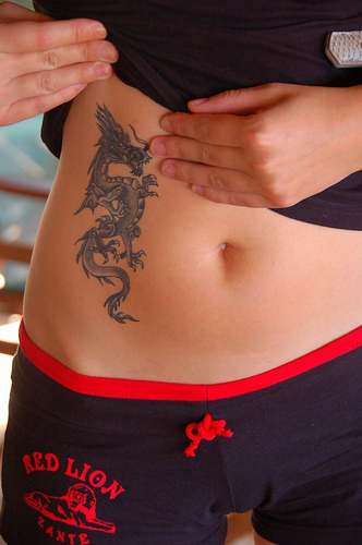 tattoos of stomach,cute stomach tattoos for girls,stomach tribal tattoos,tattoo designs on stomach