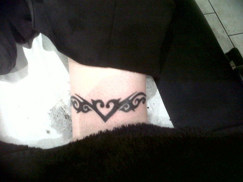lovely ankle tattoos for women,ankle bracelet tattoo,ankle bracelet tattoo designs,ankle bracelet tattoos meanings,ankle bracelet tattoo designs pictures