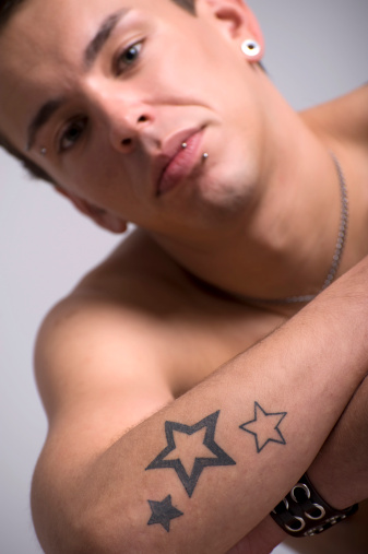 men tattoo designs,men popular star tattoos,star tattoo designs ideas for men,men star tattoos meanings,star tattoos for men images