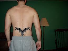 Men Lower Back Tattoo Designs