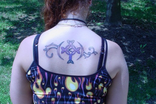 upper back tattoo designs,women upper back tattoo designs,upper back women tattoos,upper back tattoos ideas